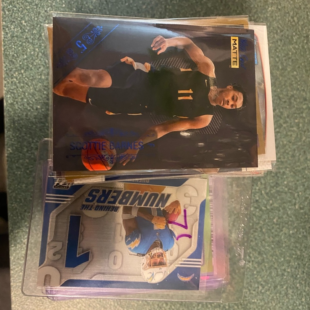 Topps Sports Trading Cards with Blue and Gold Accents